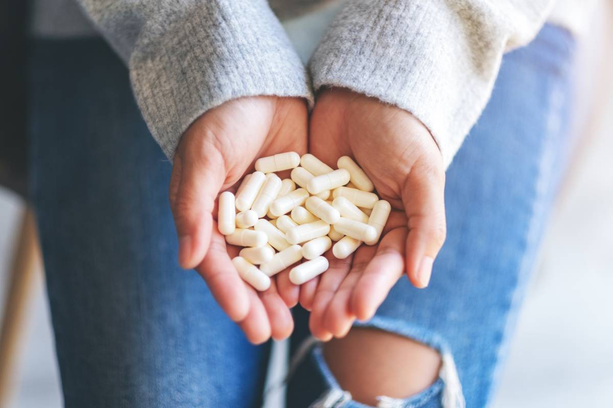 closeup-image-of-a-woman-holding-white-medicine-ca-2024-11-30-16-34-44-utc (1)