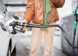 woman-refueling-car-at-gas-station-2023-11-27-05-36-03-utc (1)