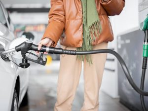 woman-refueling-car-at-gas-station-2023-11-27-05-36-03-utc (1)